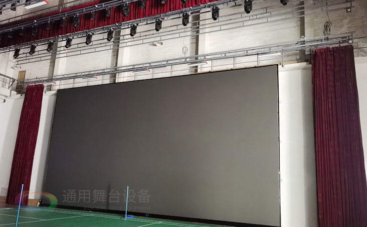 廣州黃花崗禮堂選擇通用舞臺！禮堂舞臺阻燃幕布、吊桿、舞臺燈光項目圓滿竣工！